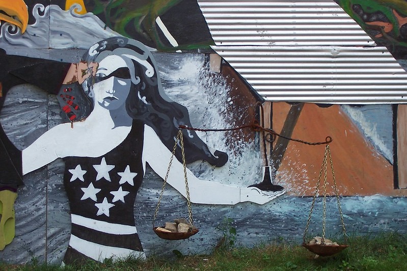 A Tale of Two Deaths: Necropolitics in the Criminal Justice System